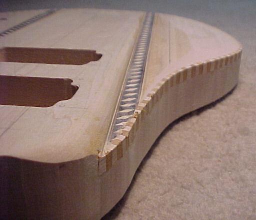 Checker binding top side after sanding