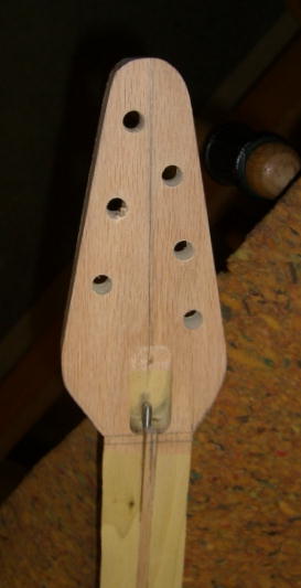 Headstock peg holes drilled