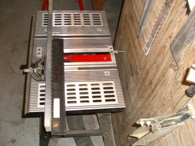 Cutting slots in fretboard