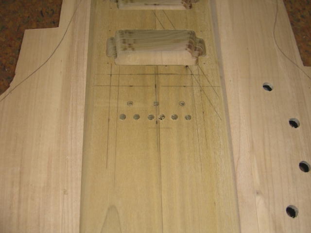 Put string holes in body - Top