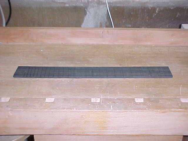 Fretboard With Slots