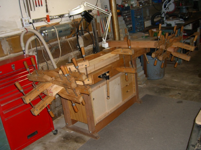 Headstock veneer clamped on - both